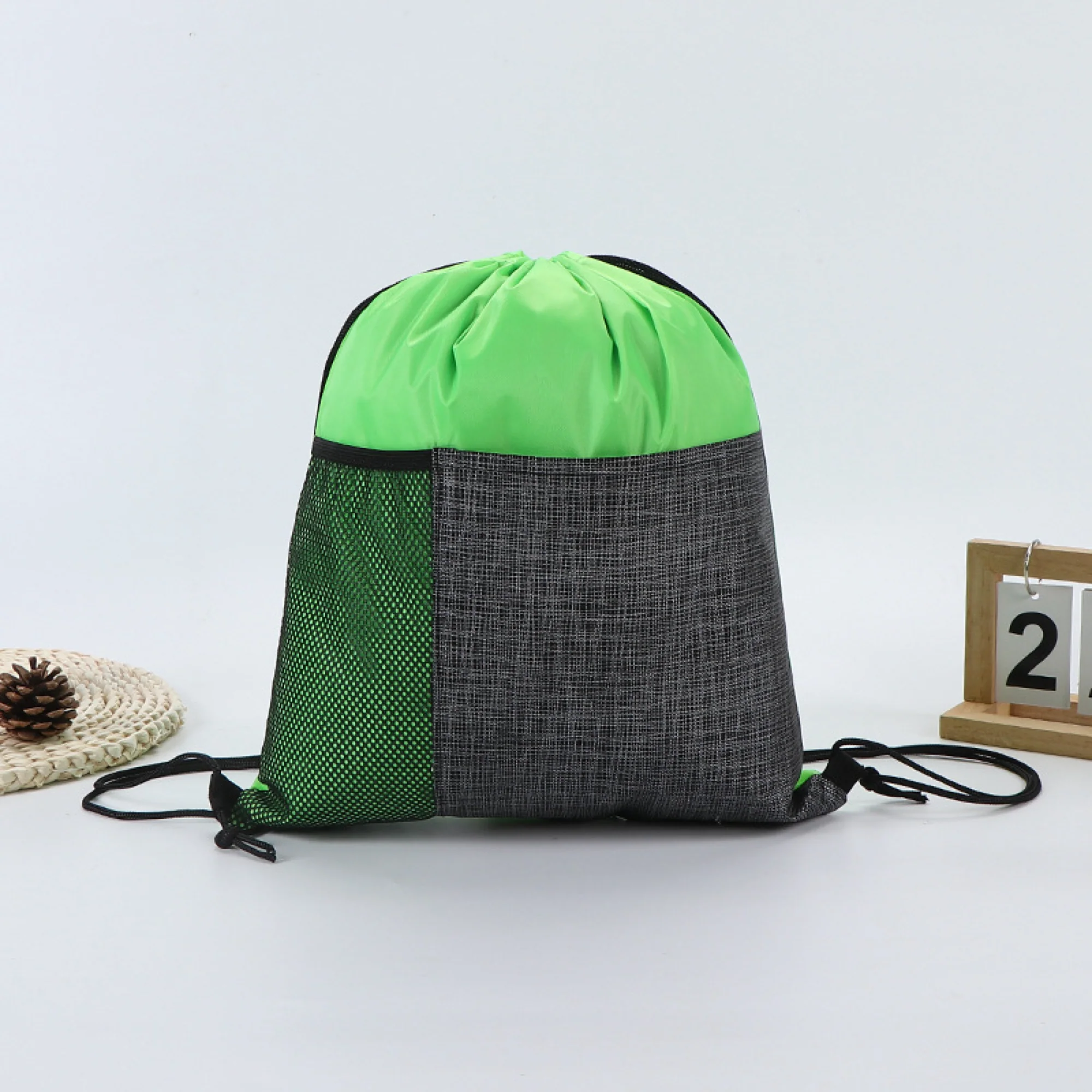 Drawstring Backpack With Front Pocket And Mesh Side Storage