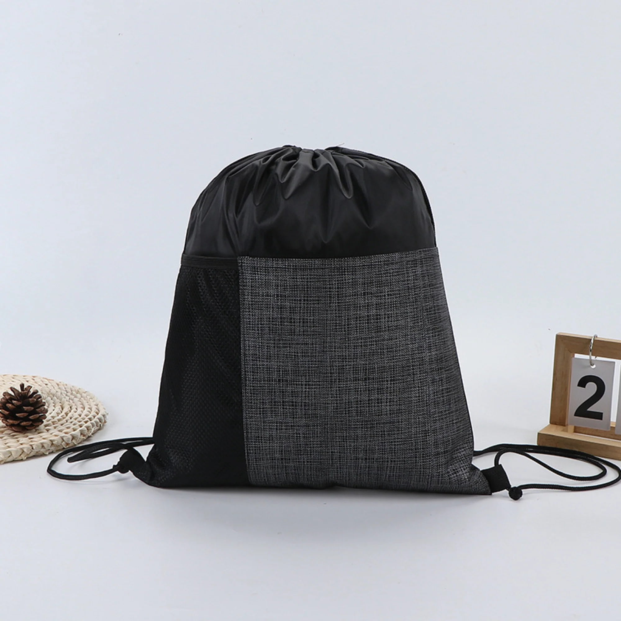 Drawstring Backpack With Front Pocket And Mesh Side Storage